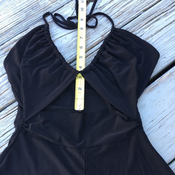 back less black romper with ties neck and open under chest. - Picture 4 of 8